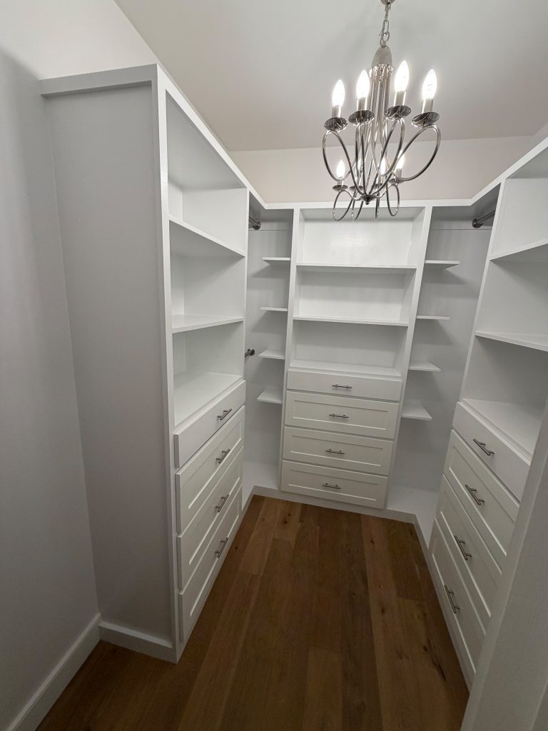 Custom built-in closet shelving completed by Ronie Construction in Massachusetts