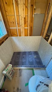 Bathroom renovation in progress during the planning and construction phase by Ronie Construction in Massachusetts