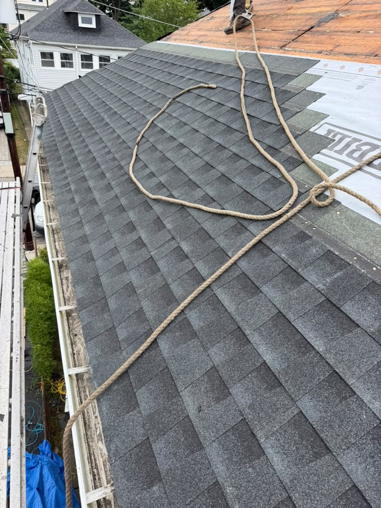 Residential roofing project by Ronie Construction in Massachusetts before the winter season